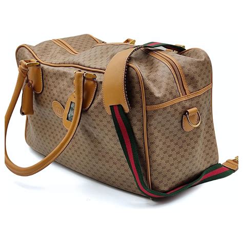 Sacs de voyage Gucci pour Femme .